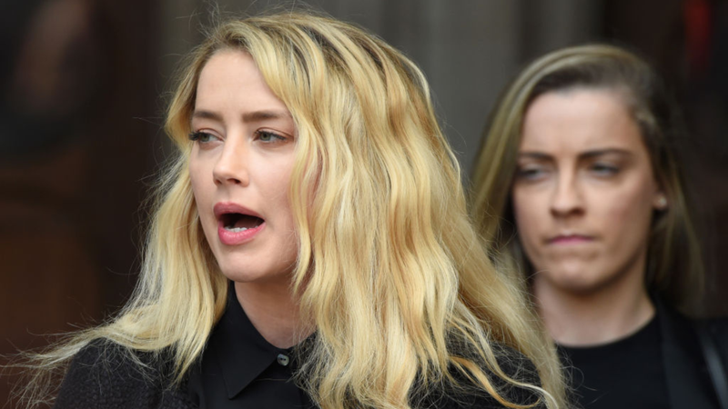Amber Heard relata maus tratos de Johnny Depp a seu cão - Getty Images